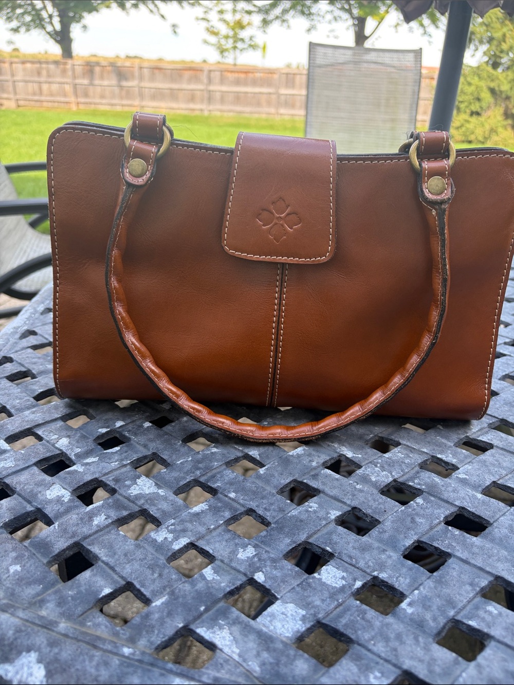 Patricia Nash Brown Leather Shoulder Bag with Tab Closure